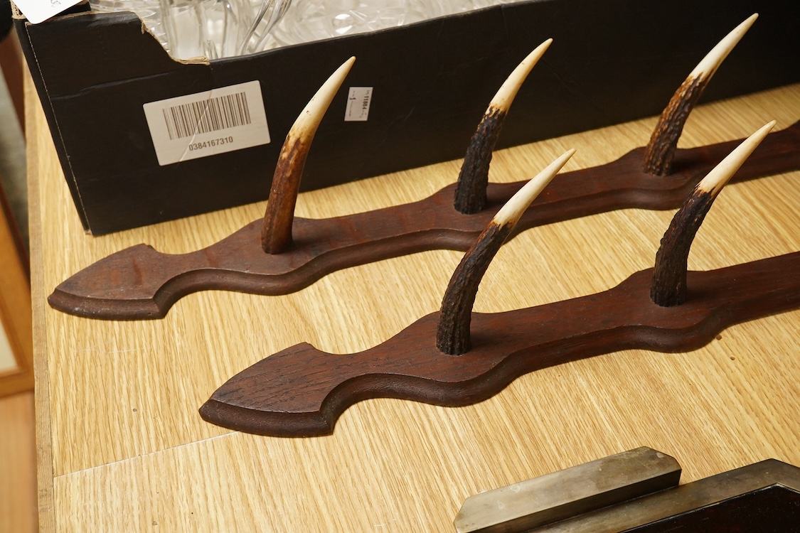 A pair of antler gun racks, 70cm high